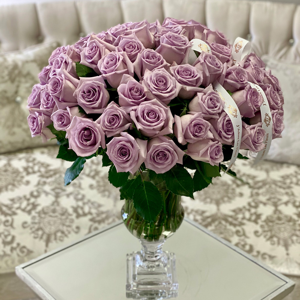 75 Lavender Roses in a Glass Vase