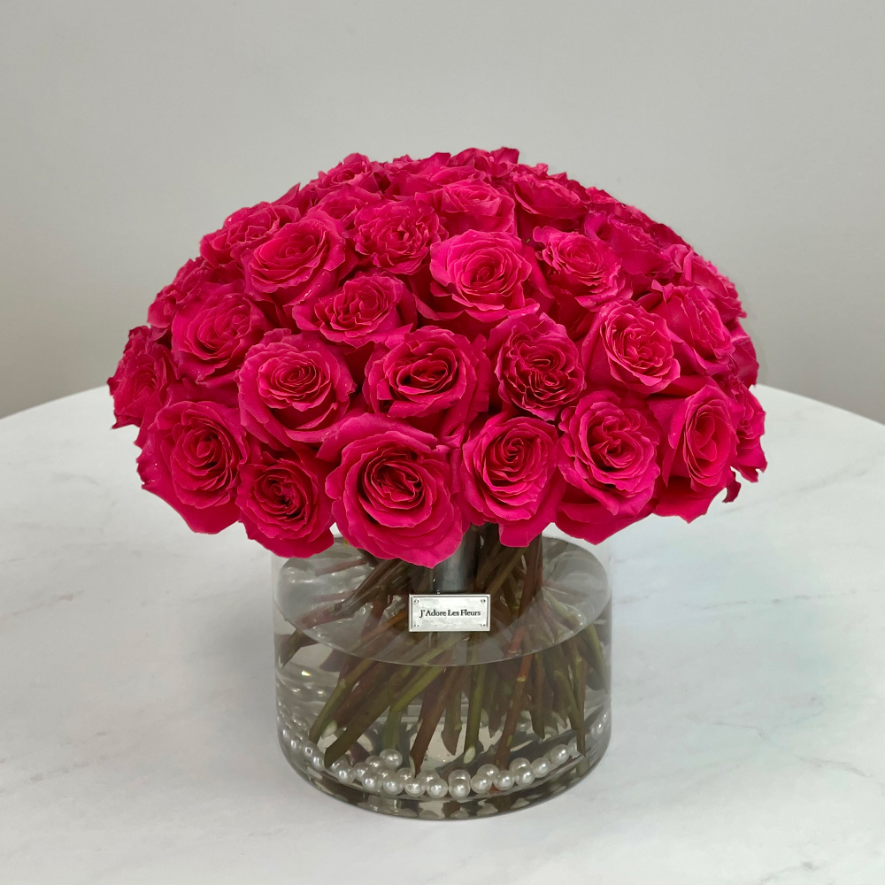 Clean and Classic Fuchsia Roses in a Vase
