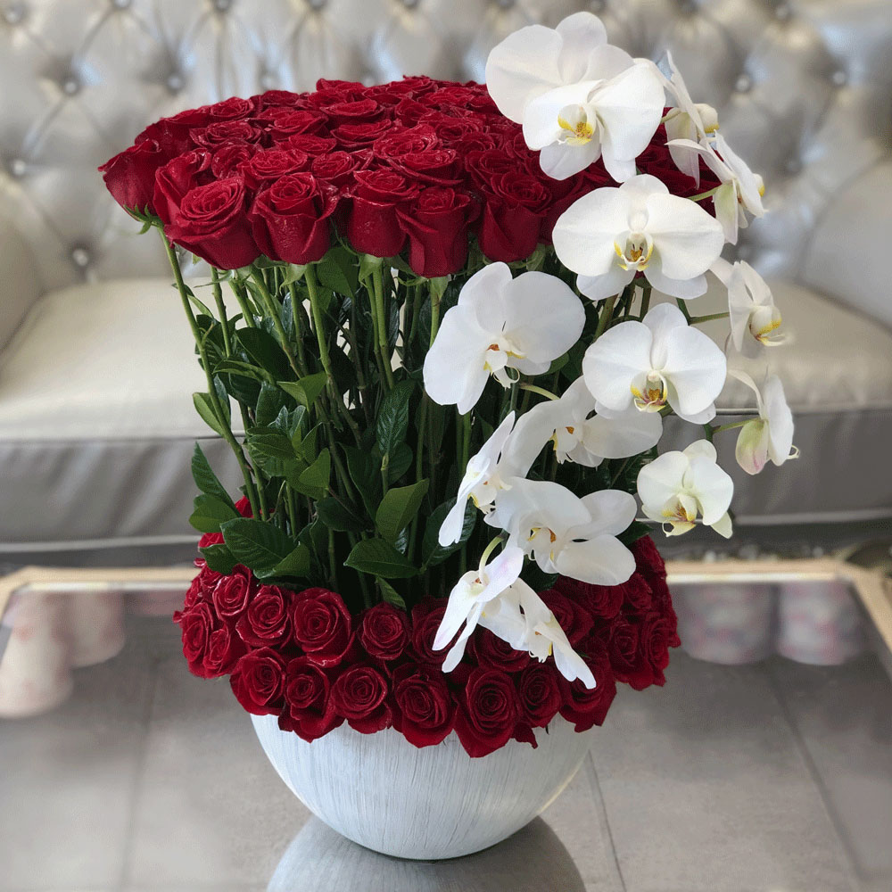 100 Standing Roses & Orchids In A Vase